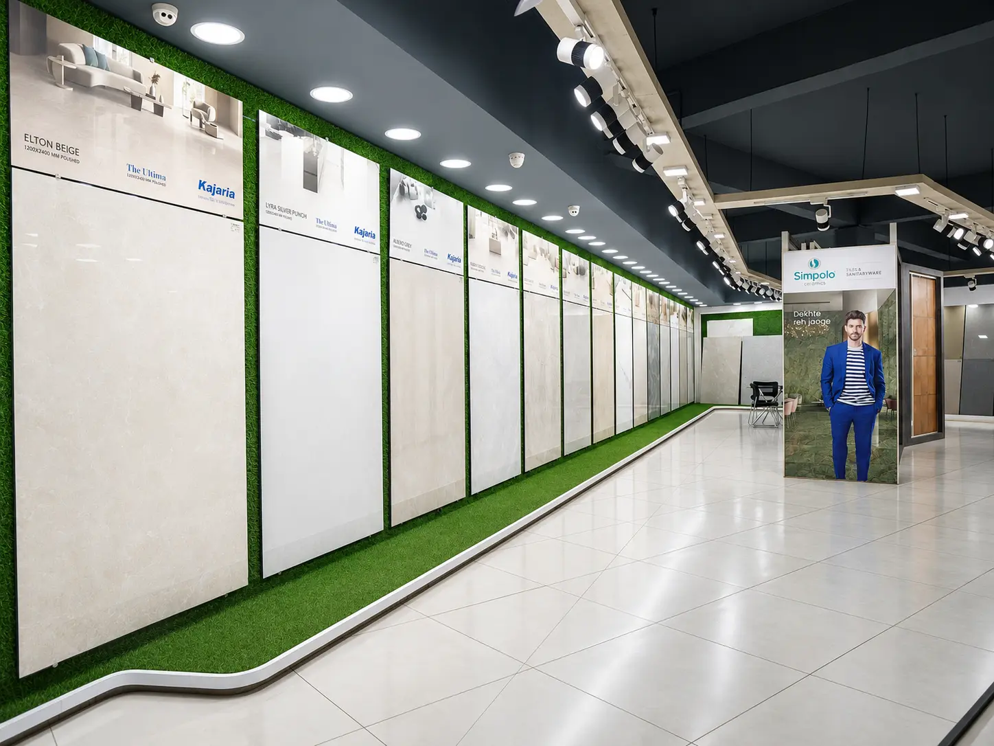 Large-format tile display wall with bright showroom lighting and sample panels.