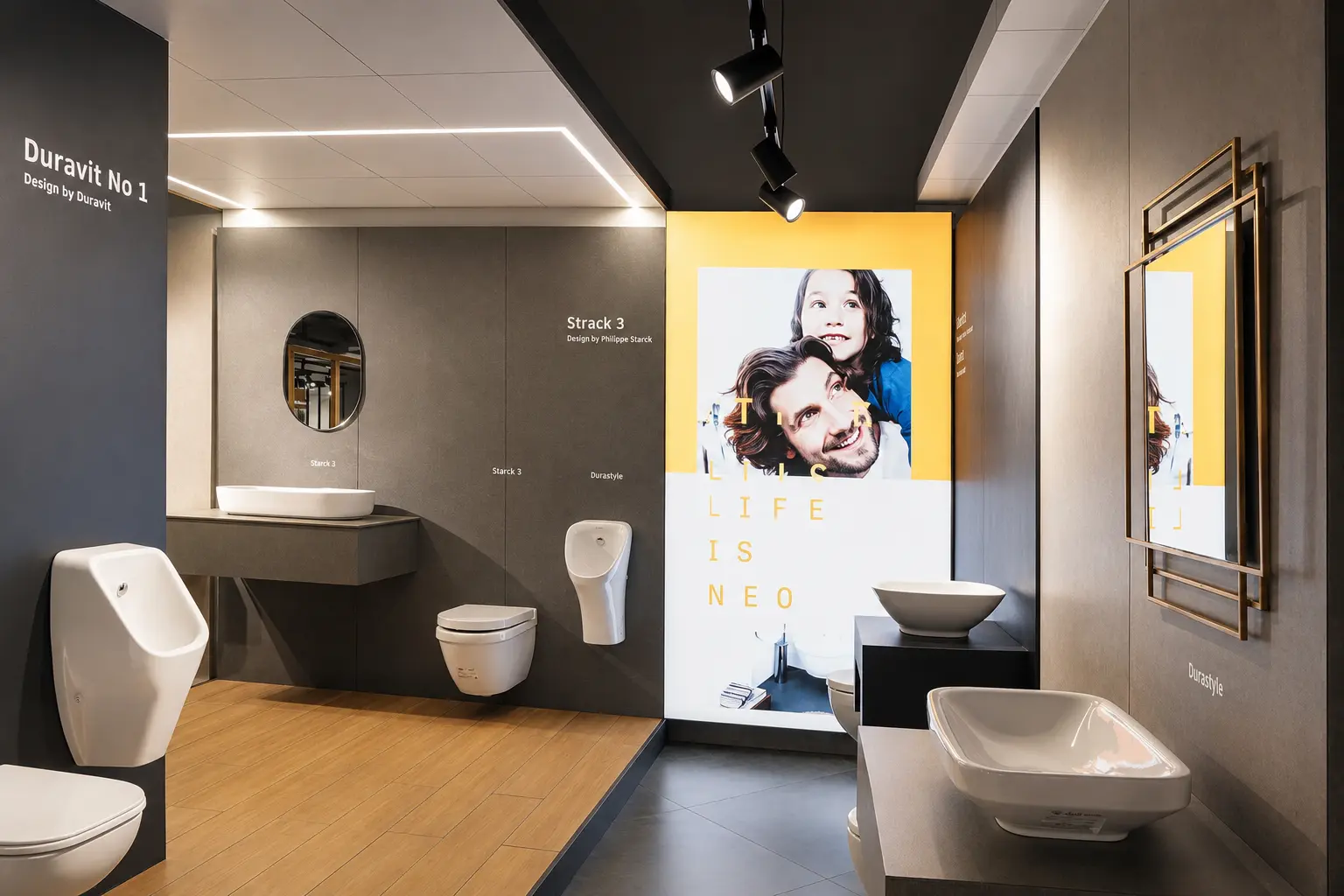 Minimal Duravit bathroom display with basins, mirrors and warm accent lighting.